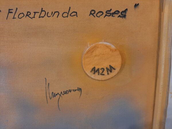 The back of a cotton painting ""The evening scent of floribunda roses" by W2W. Close-up